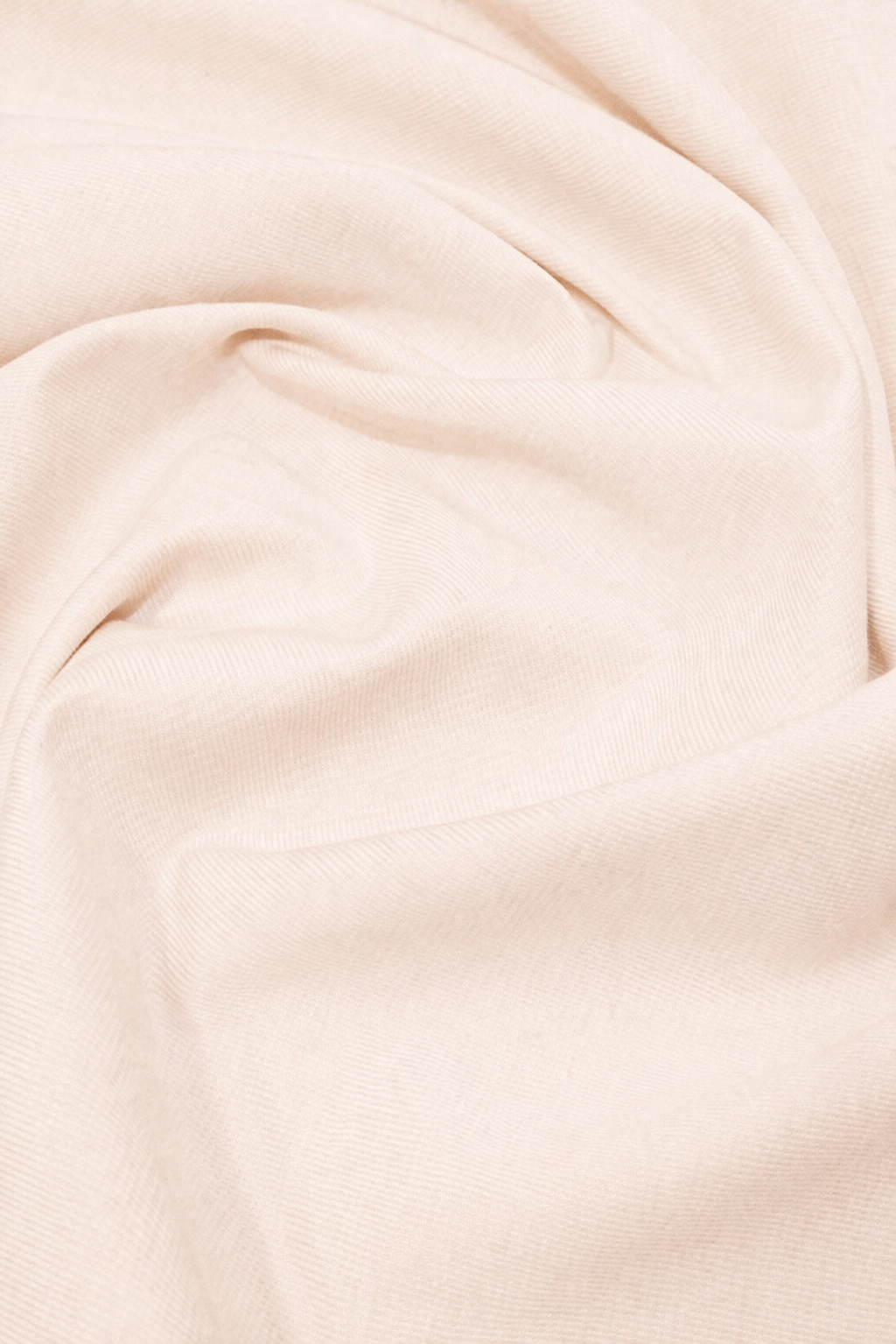 Classic Light Jersey Hijab in Shell by Amanah, styled in a soft draped wrap.