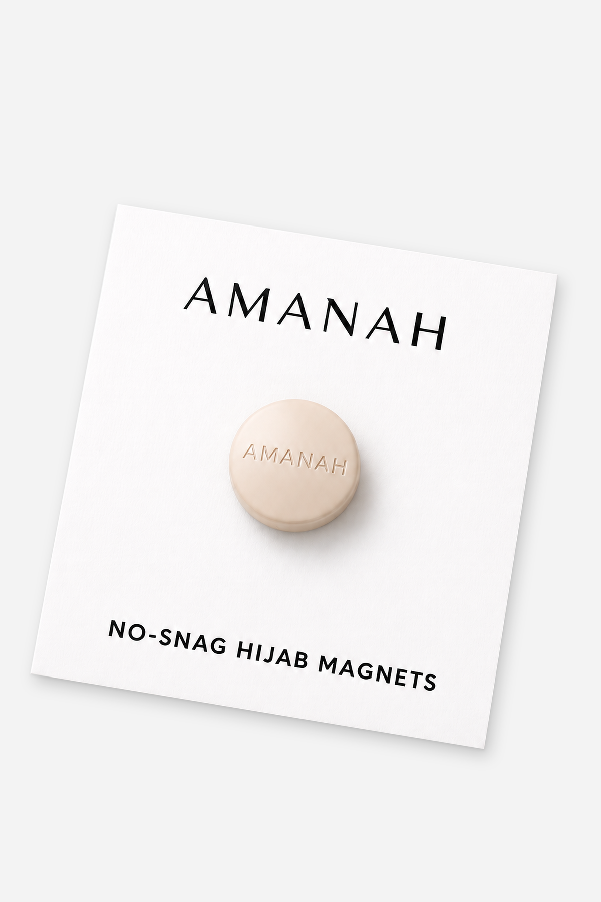 Matte beige no-snag hijab magnets with engraved Amanah logo