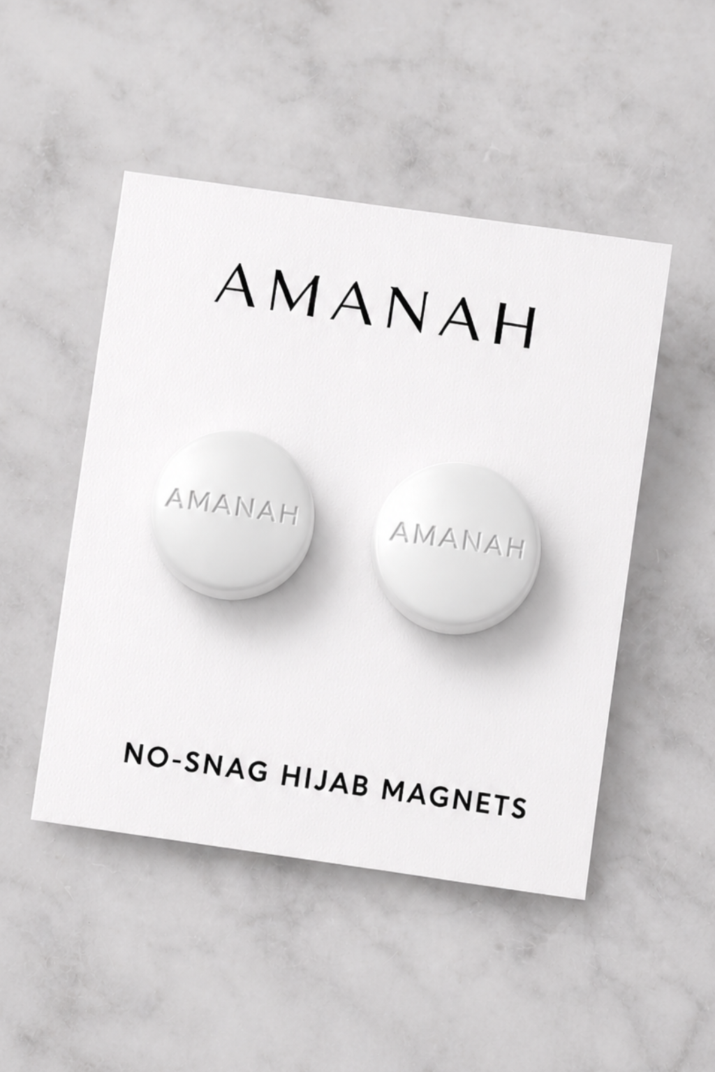 Matte white no-snag hijab magnets with engraved Amanah logo