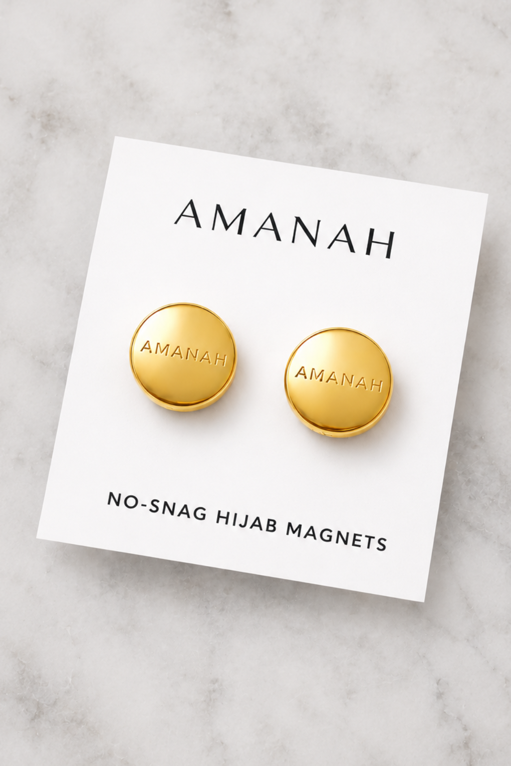 Metallic gold no-snag hijab magnets with engraved Amanah logo