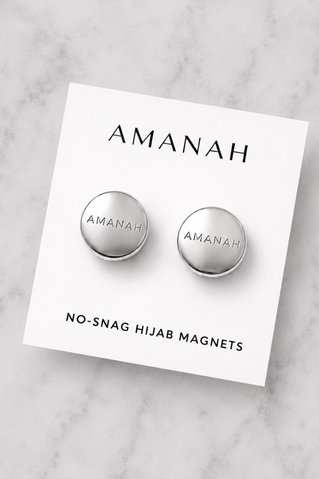 Metallic silver no-snag hijab magnets with engraved Amanah logo