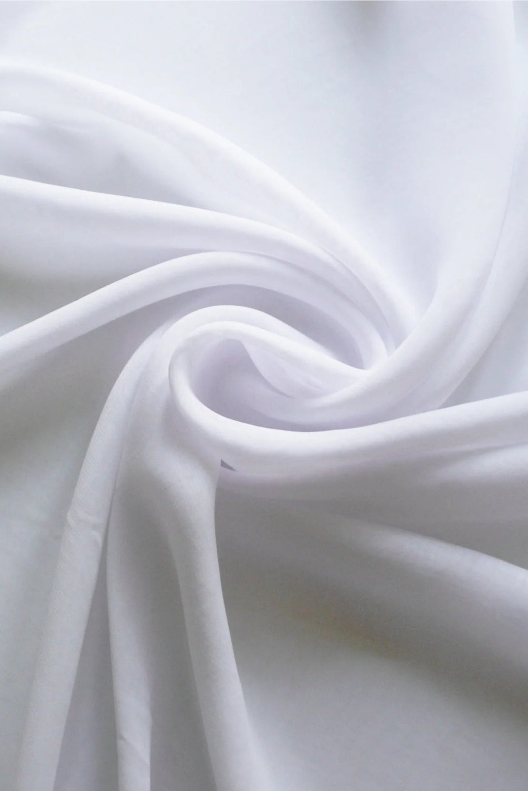 Premium Luxe Chiffon Hijab in White by Amanah, styled in a soft draped wrap.